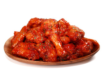 Sweet and spicy Korean-style fried chicken, known as Yangnyeom Chicken. Crispy outside, juicy inside. A beloved K-Food served on a skillet or wooden plate, perfect for home or restaurant.