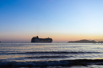 Transatlantic leaving the port of Santos during sunset