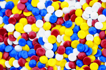 Colorful Plastic Discs in Bright Primary Colors for Creative Projects