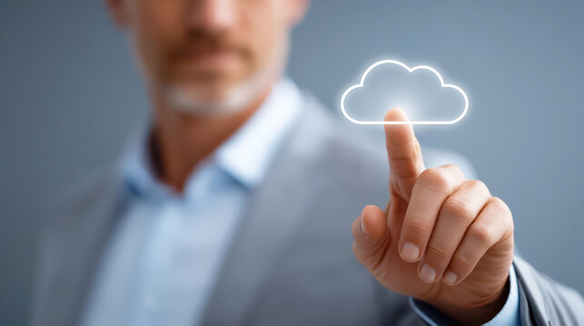 A Businessman touching digital cloud icon, symbolizing modern technology and innovation