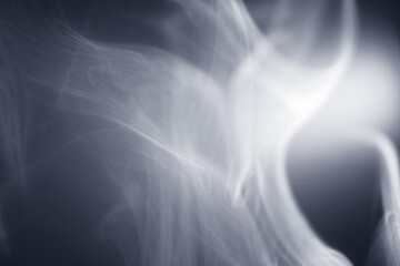 Macro shot of smoke vapour particles release in the air