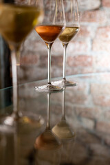 Visit of wine cellar, tasting of brut champagne sparkling wine produced by traditional method in underground caves close up