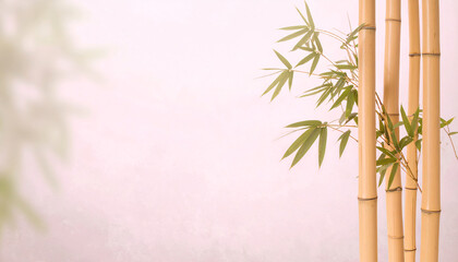 Green bamboo stalks with leaves against a softly blurred pastel background emphasizing nature and tranquility.