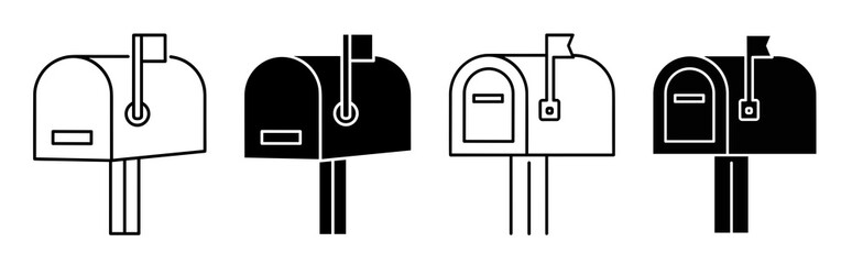 Four mailboxes in black and white showing different styles and flag positions in a row isolated