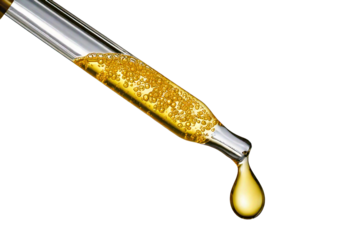 Cosmetic pipette with drops of cosmetic oil isolated on transparent or white background