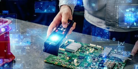Worker using handheld terminal and digital technology concept