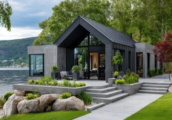 A modern house in Norway with an exterior wall of light grey painted smooth plaster, and a black roof with glass windows on the front facade