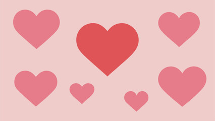 Pink and red hearts arranged on light pink background symbolizing love and affection