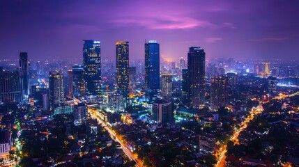 Obraz premium A vibrant city skyline at night with tall buildings illuminated by neon lights, a mix of urban and natural elements, and a dramatic sky with a gradient of purple and orange hues.