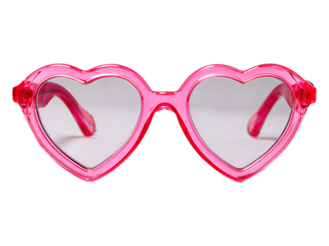 Close up of pink heart shaped sunglasses isolated on white or tansparent background.