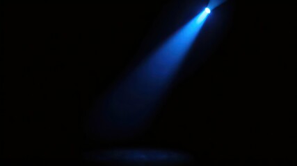 Single beam of vivid color cuts through the darkness and illuminates the space below for a striking visual effect.