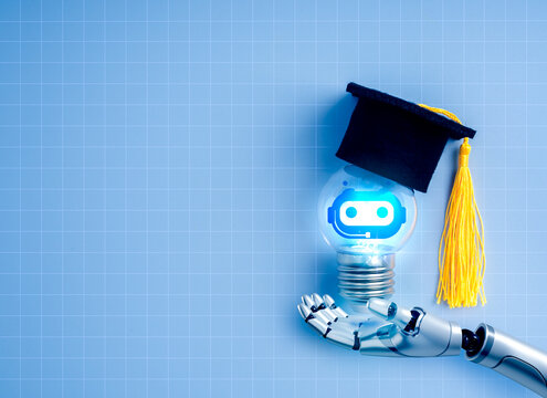 AI smart learning, artificial intelligence assistant technology concept. Chatbot icon glowing inside light bulb, wearing graduation hat, holding by robot humanoid hand on blue network background.