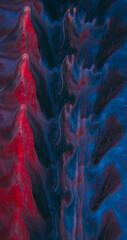 Fractal flow ink. Art fluid blur. Red blue black acrylic blend color. Sparkling dye particles defocused abstract kaleidoscopic wave background.
