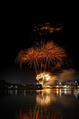 Naklejka premium fireworks over the river