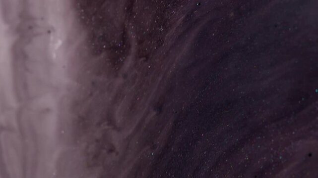 Ink swirl. Sparkling emulsion. Grunge gray black white paint spread shimmering liquid texture. Smooth mix particles blur abstract background.