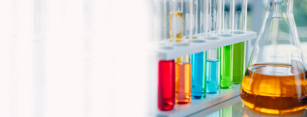 Banner Science chemistry glass tubes object on lab background. Wide Liquid tube biology laboratory chemical fluid scientist object medical glass tubes. Chemistry scientific background with Copy Space