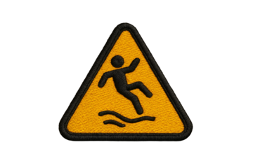 Triangular emblem alerts for slippery surface with person falling