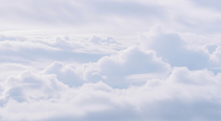 Picturesque fluffy clouds in a bright sky creating an ethereal, dreamy atmosphere