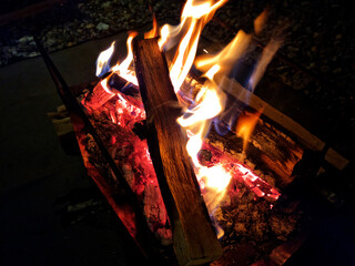 It is a flame rising from a bonfire.	