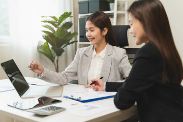 Financial consult planning investor asses and present to client, Close up shot client and advisor review investment strategy in the office.