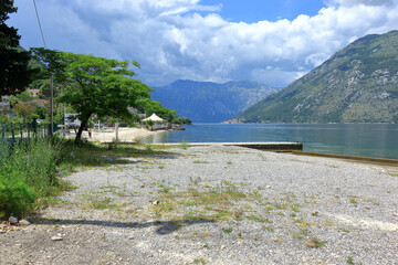 A shingle beach at the side of the Bay of Kator