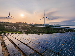 Solar photovoltaic windmill wind energy at sunset