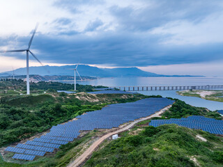 Solar photovoltaic windmill wind energy at sunset