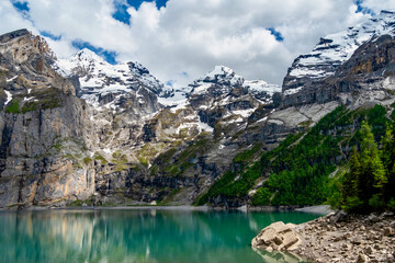 Obraz premium The Oeschinensee on a cloudy day