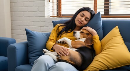 Serene Moment: Woman Relaxing with Beagle on Couch at Home