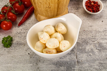 Mozzarella balls cheese in the bowl