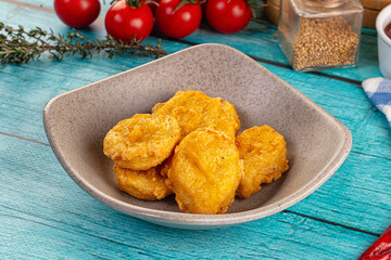 Golden crispy fried chicken nuggets