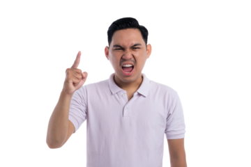 Angry young Asian man shouting and pointing index finger while expressing frustration isolated on transparent background