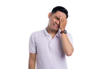 Frustrated young man touching forehead with pained expression, feeling regret and stress isolated on transparent background