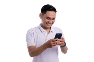 Happy young man smiling while using smartphone and typing message isolated on transparent background