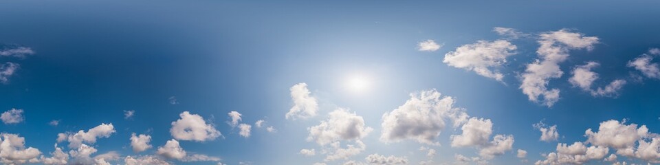 Sky 360 panorama - Bright blue sky filled with fluffy white Cumulus clouds. Seamless hdr spherical 360 panorama. Sky dome, sky replacement for aerial drone 360 panoramas. Weather and climate change