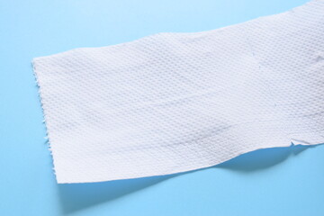 white paper tissue on blue background