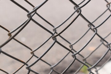 old wire mesh on dirty wall, construction industry
