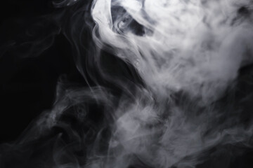 White clouds of vapor smoke are isolated on a black background. overlay