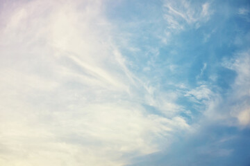 High clouds in the summer sky. Sky background. Meteorological observations of the sky.
