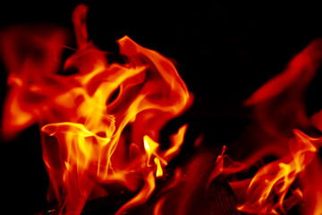 Fototapeta premium Background of the flame in the oven. Overlay layer. Tongues of fire in a fireplace.