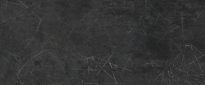 Detailed dark gray scratch textured surface perfect for grunge and modern design projects with numerous marks