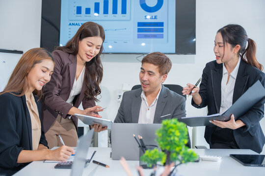 Laptop, professional asian business team in meeting or data analysis for group project collaboration or office employees discussing planning, business people, technology