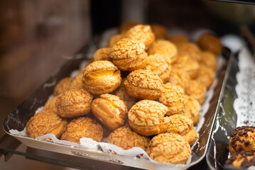 Fresh and delicious homemade chocolate chip cookies on baking paper
