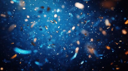 Fototapeta premium abstract scene of glowing particles and dust floating in deep blue space evoking a cosmic or magical atmosphere