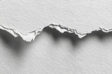 Torn white textured paper close up background
