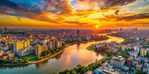 Dhaka's vibrant cityscape ablaze in sunset's golden hues, a river winding through densely packed buildings.