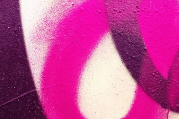 Fototapeta na wymiar Vibrant pink, purple spray paint texture with gritty surface. 80s graffiti style, bold street art vibes. Creative backgrounds, digital art, urban designs, modern 90s, 2000s banner visuals.