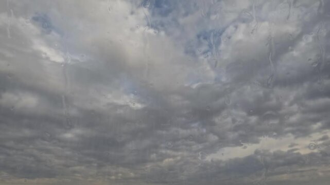 timelapse of the sky of shower rain with heavy mystical storm clouds