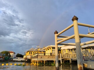 port view riverside rainbow Chao Phraya boat Thailand Bangkok river