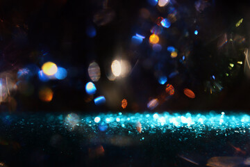 abstract glitter blue and gold lights background. de-focused